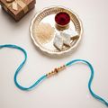 Set of 12 Traditional Designer Rakhis for Brother | VyomBox | Sky Blue