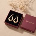 Elegant Gold-Toned Fluid Drop Hoop Earrings for Women & Girls | Trendy Fashion Jewellery for Daily, Office & Party Wear